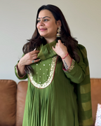 Dhwani wearing premium green silk anarkali suit with mirror embroidery and zari dupatta – Go Desi Canada