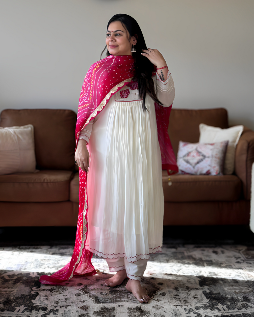 Dhwani wearing premium mul chanderi white anarkali suit with red bandhani dupatta – Go Desi Canada