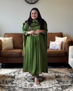 Dhwani wearing premium green silk anarkali suit with mirror embroidery and zari dupatta – Go Desi Canada