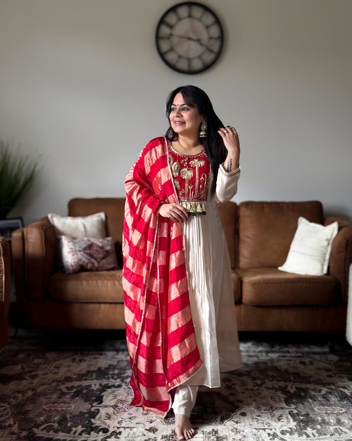 Dhwani wearing premium ivory silk anarkali suit with red embroidered yoke and banarasi dupatta – Go Desi Canada