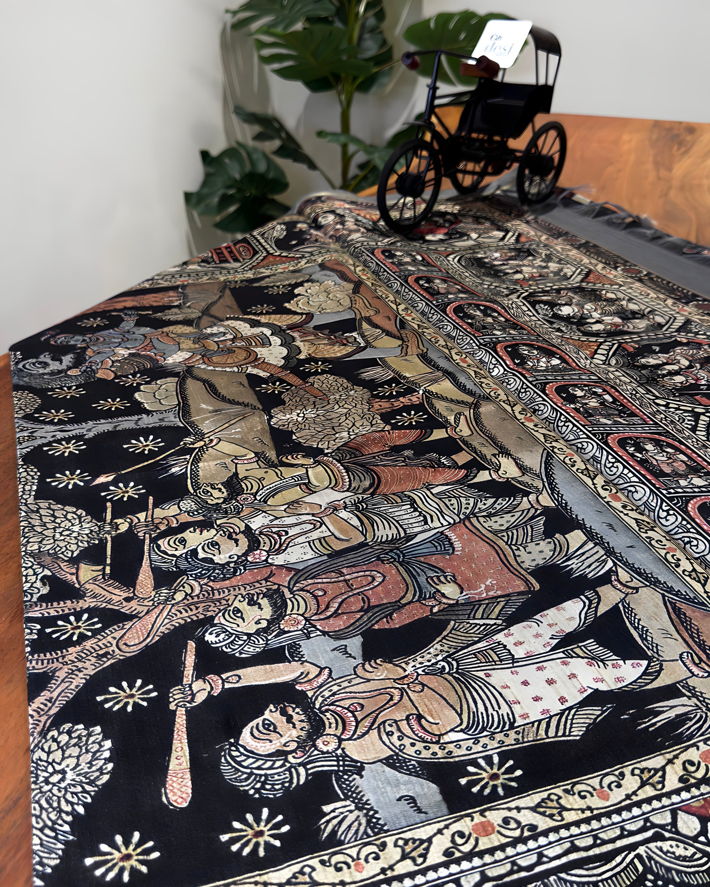 Decorative tablecloth with intricate patterns on a table
