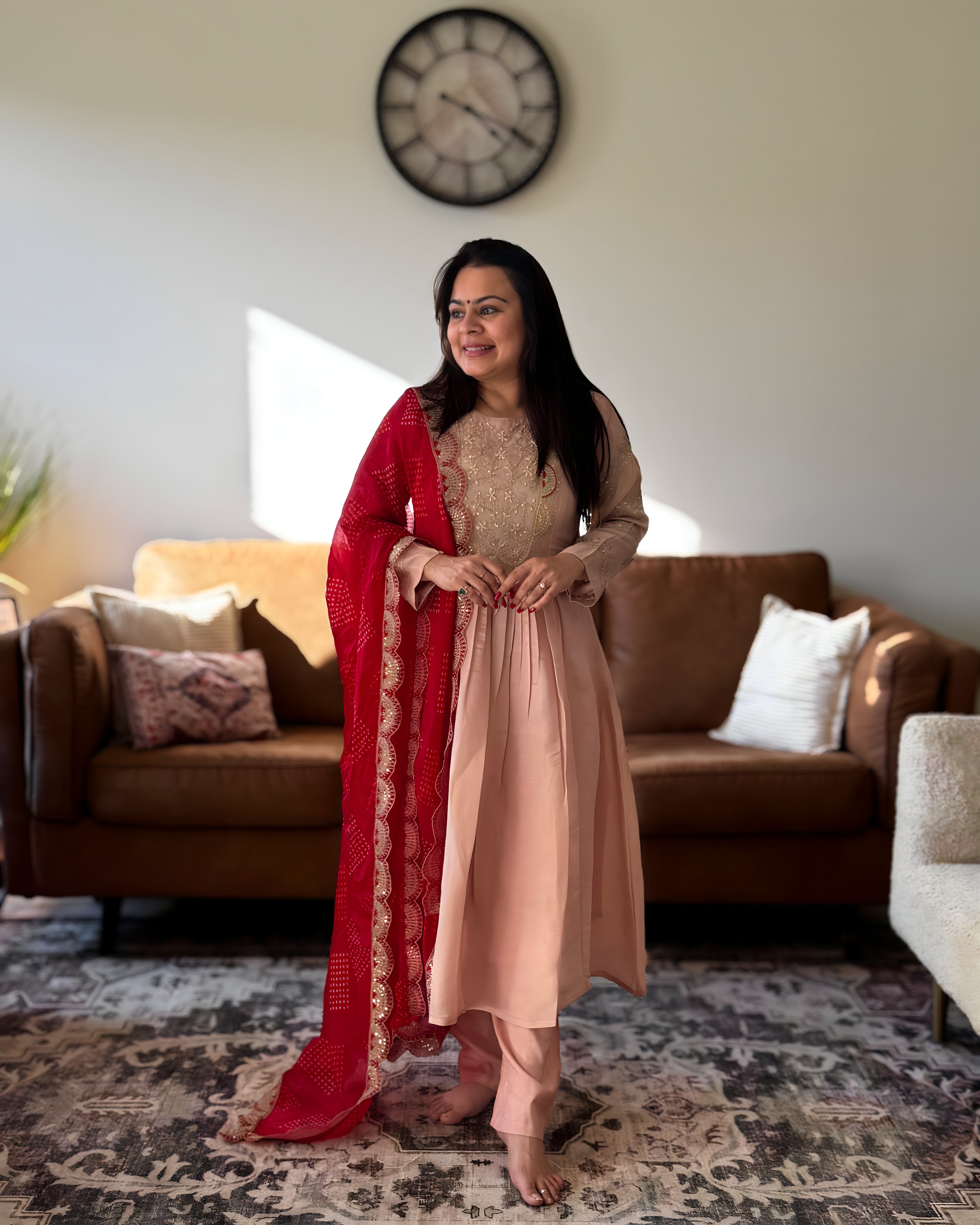 Dhwani wearing premium silk peach anarkali suit with red bandhani dupatta – Go Desi Canada