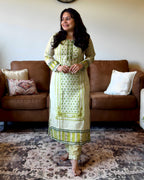 Dhwani wearing premium cotton green printed suit with embroidered neckline and matching dupatta – Go Desi Canada