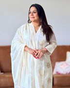 Dhwani wearing ivory glass tissue golden embroidered suit with lace detailing and matching dupatta – Go Desi Canada