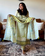 Dhwani wearing premium cotton green printed suit with embroidered neckline and matching dupatta – Go Desi Canada