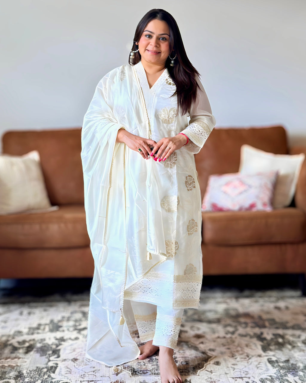 Dhwani wearing ivory glass tissue golden embroidered suit with lace detailing and matching dupatta – Go Desi Canada