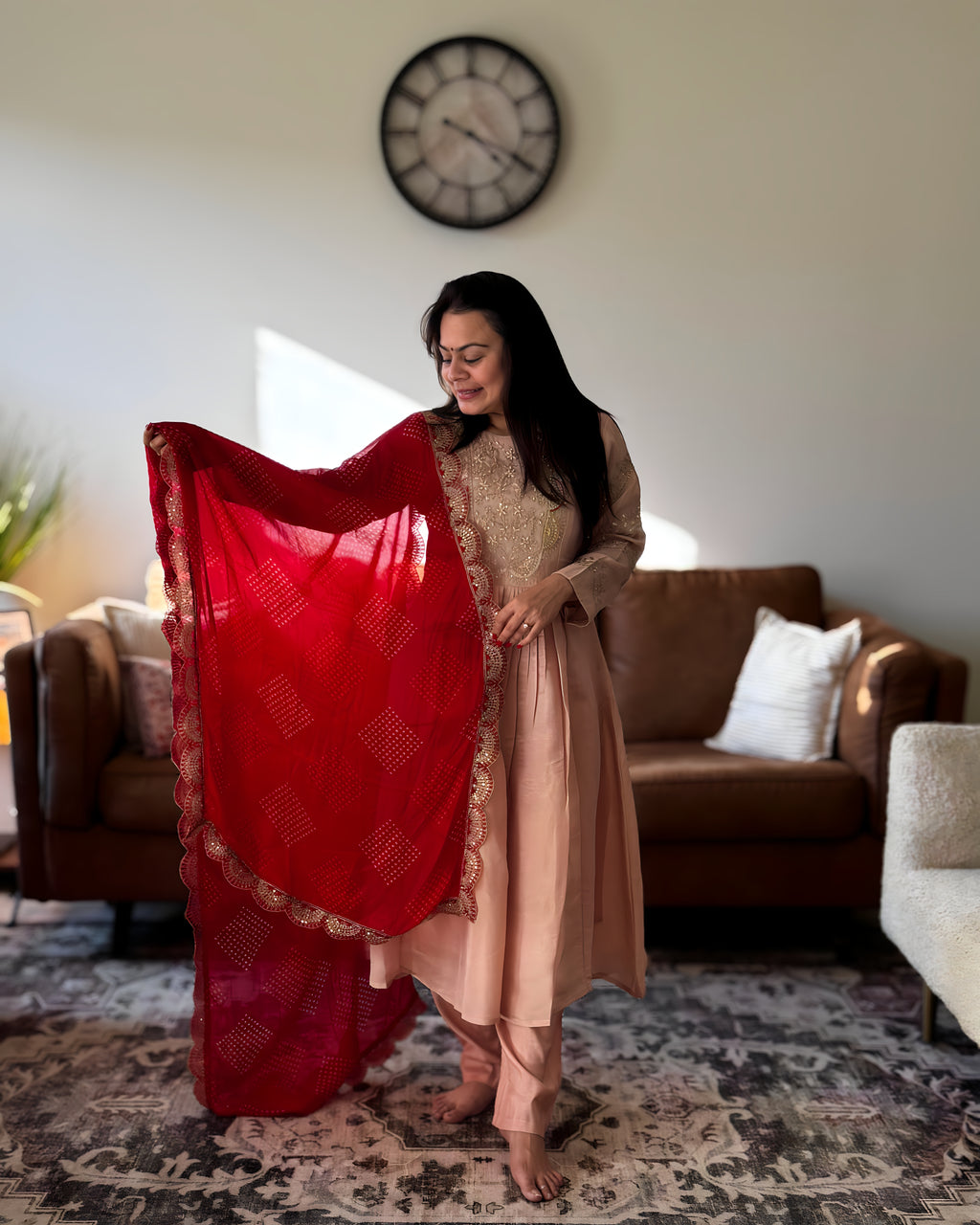 Dhwani wearing premium silk peach anarkali suit with red bandhani dupatta – Go Desi Canada