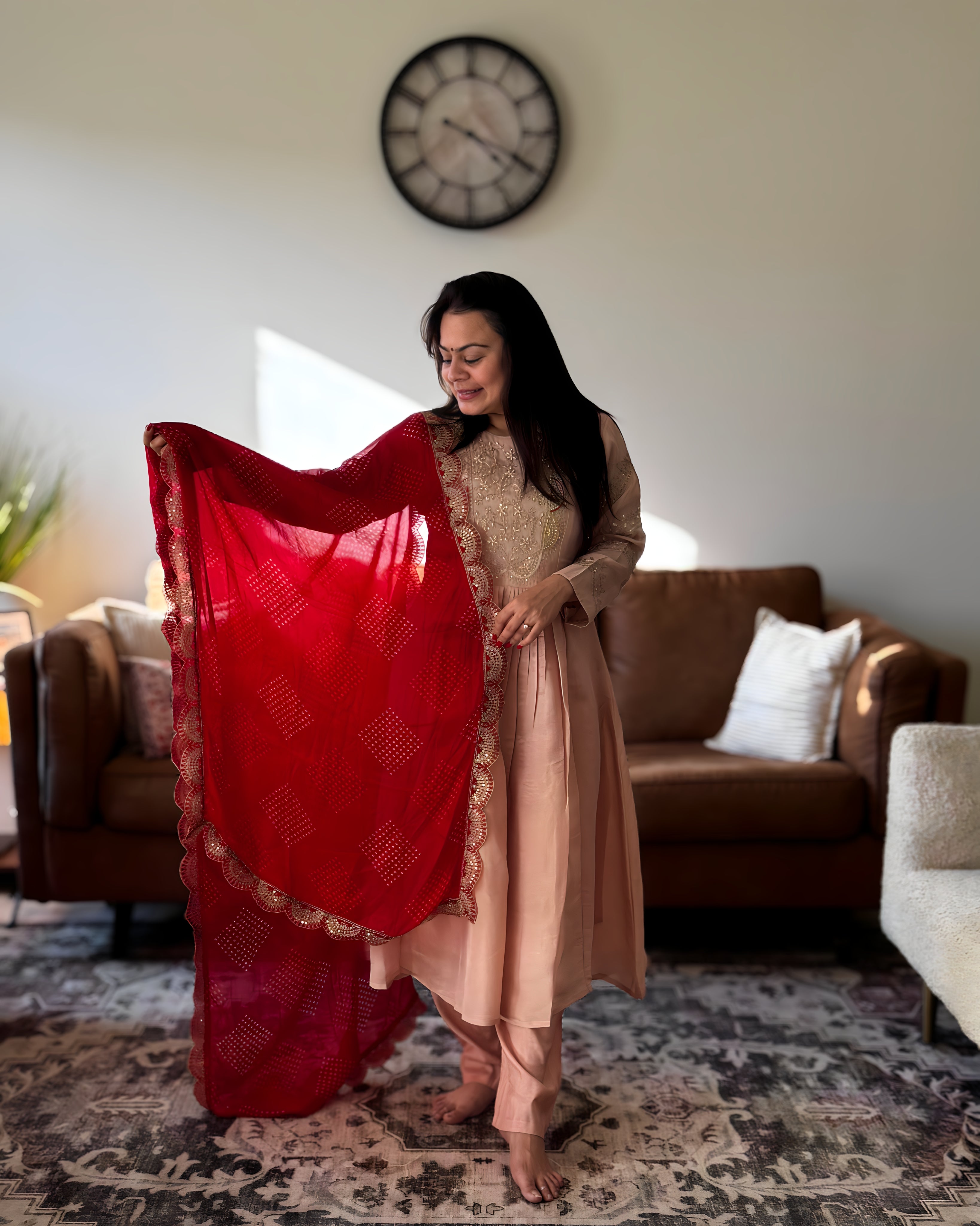 Dhwani wearing premium silk peach anarkali suit with red bandhani dupatta – Go Desi Canada