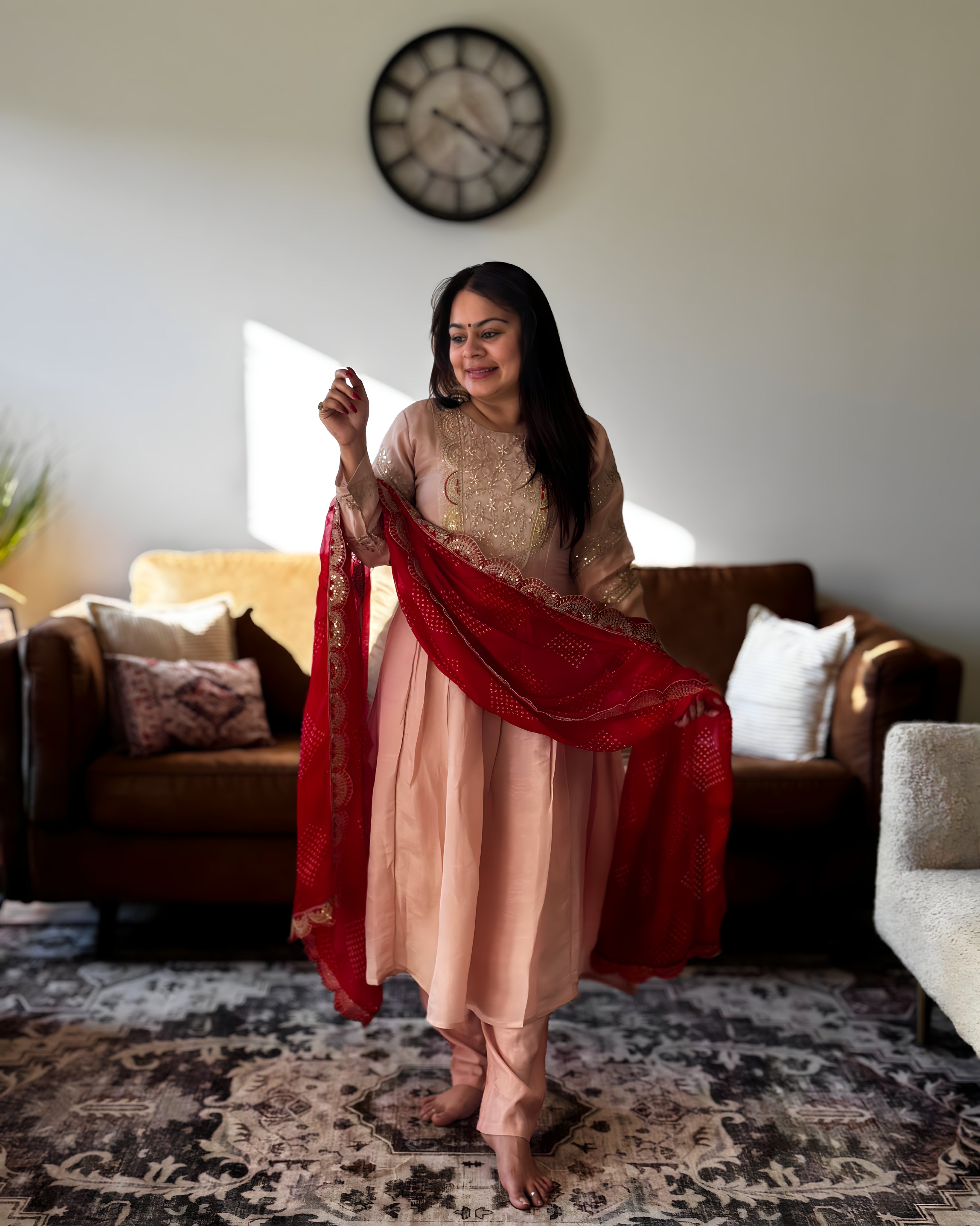 Dhwani wearing premium silk peach anarkali suit with red bandhani dupatta – Go Desi Canada