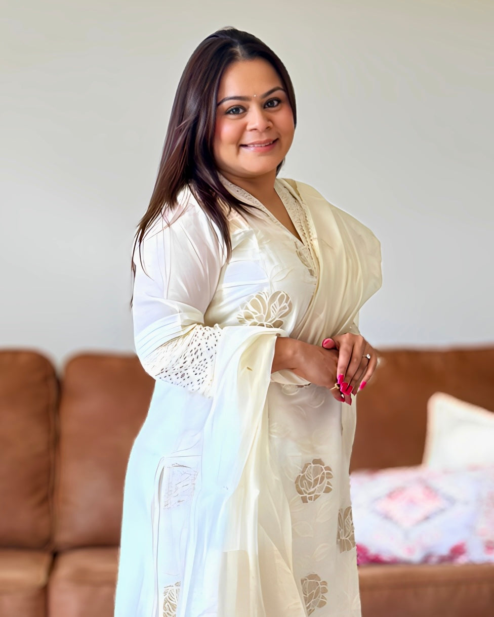 Dhwani wearing ivory glass tissue golden embroidered suit with lace detailing and matching dupatta – Go Desi Canada