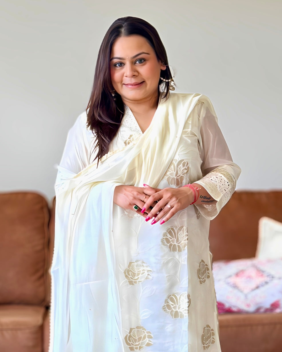 Dhwani wearing ivory glass tissue golden embroidered suit with lace detailing and matching dupatta – Go Desi Canada