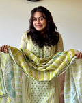 Dhwani wearing premium cotton green printed suit with embroidered neckline and matching dupatta – Go Desi Canada